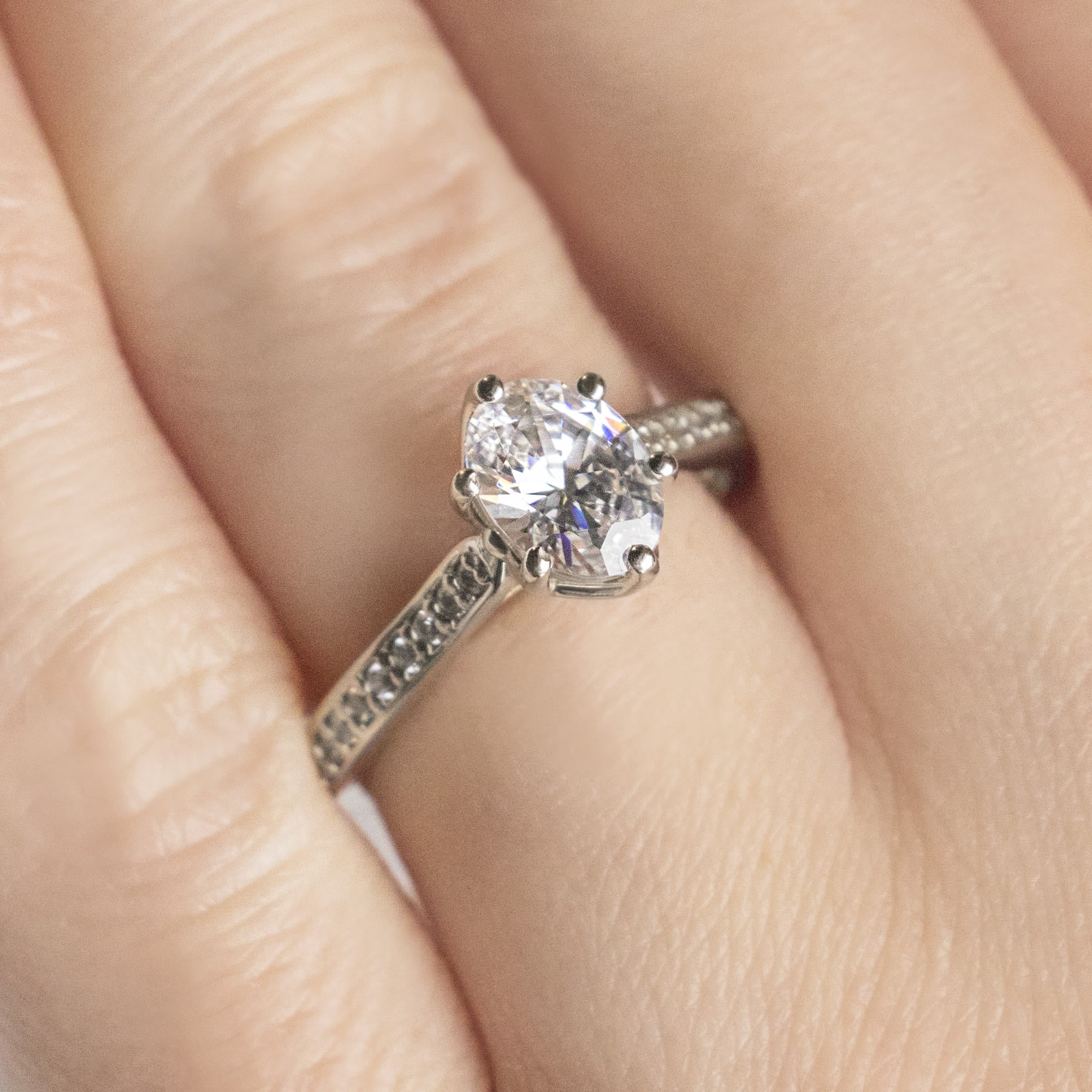 Oval Cut Pave Set Moissanite Engagement Ring