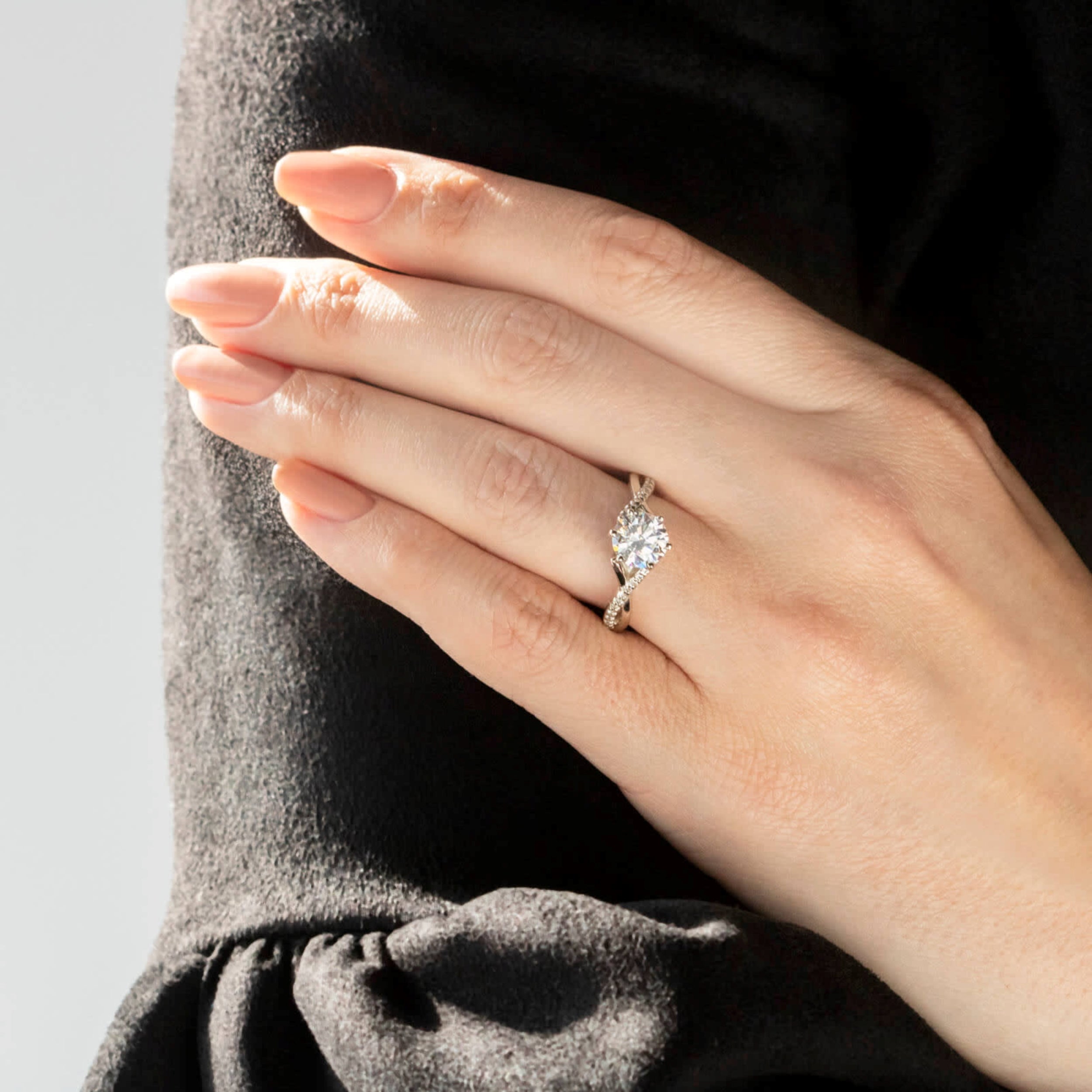 Brilliant Round Cut Twisted Engagement Ring