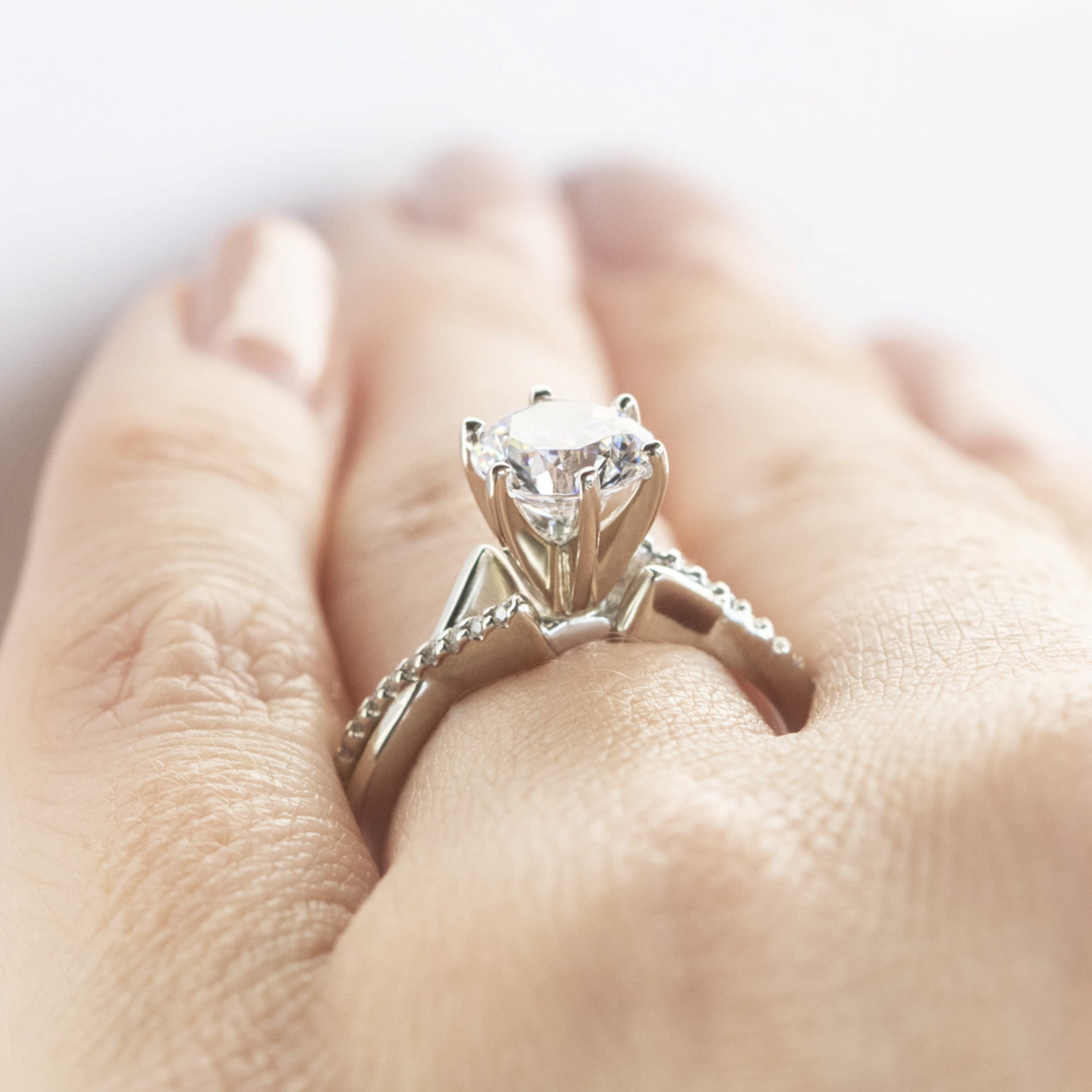 Brilliant Round Cut Twisted Engagement Ring