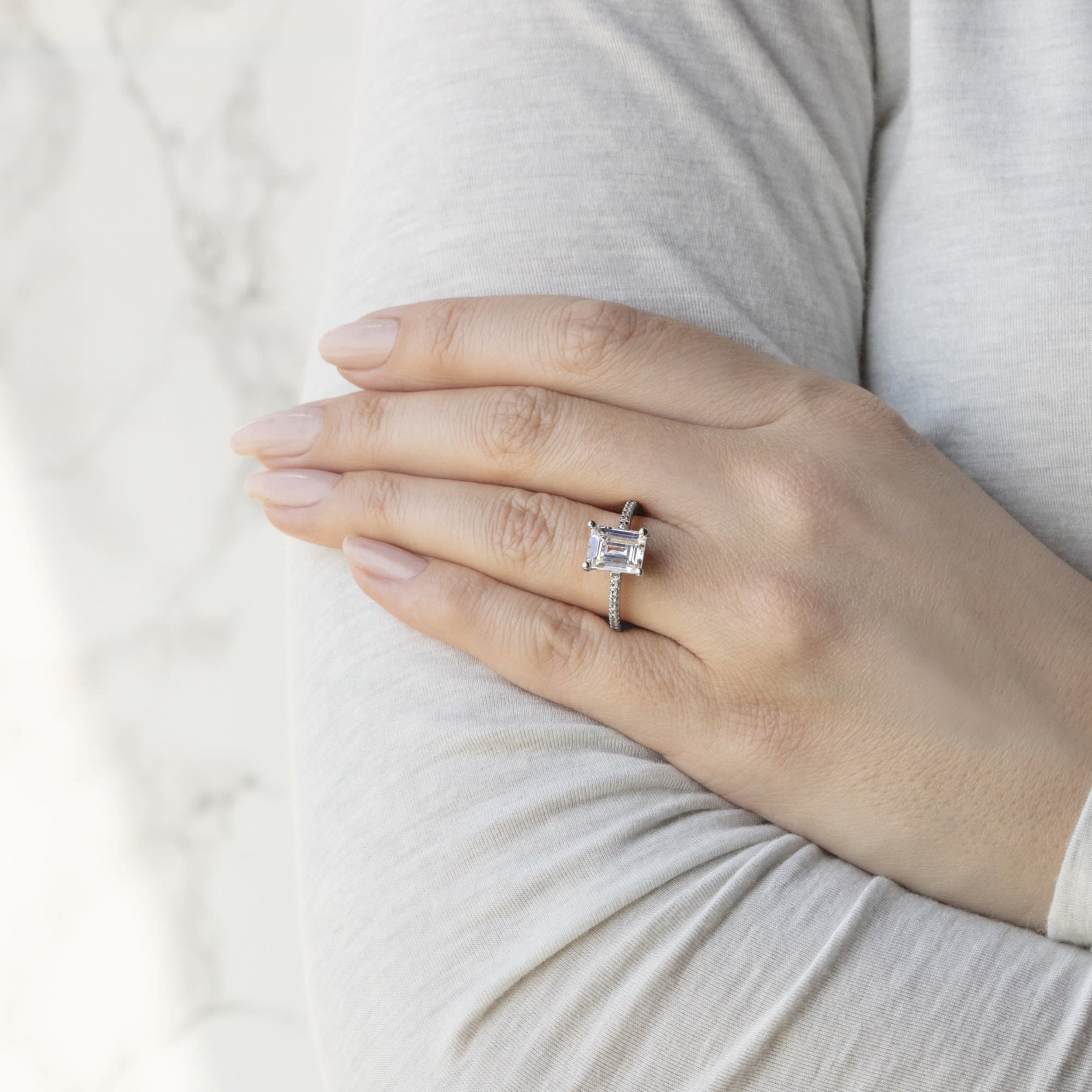 Emerald Cut Pave Set Moissanite Engagement Ring