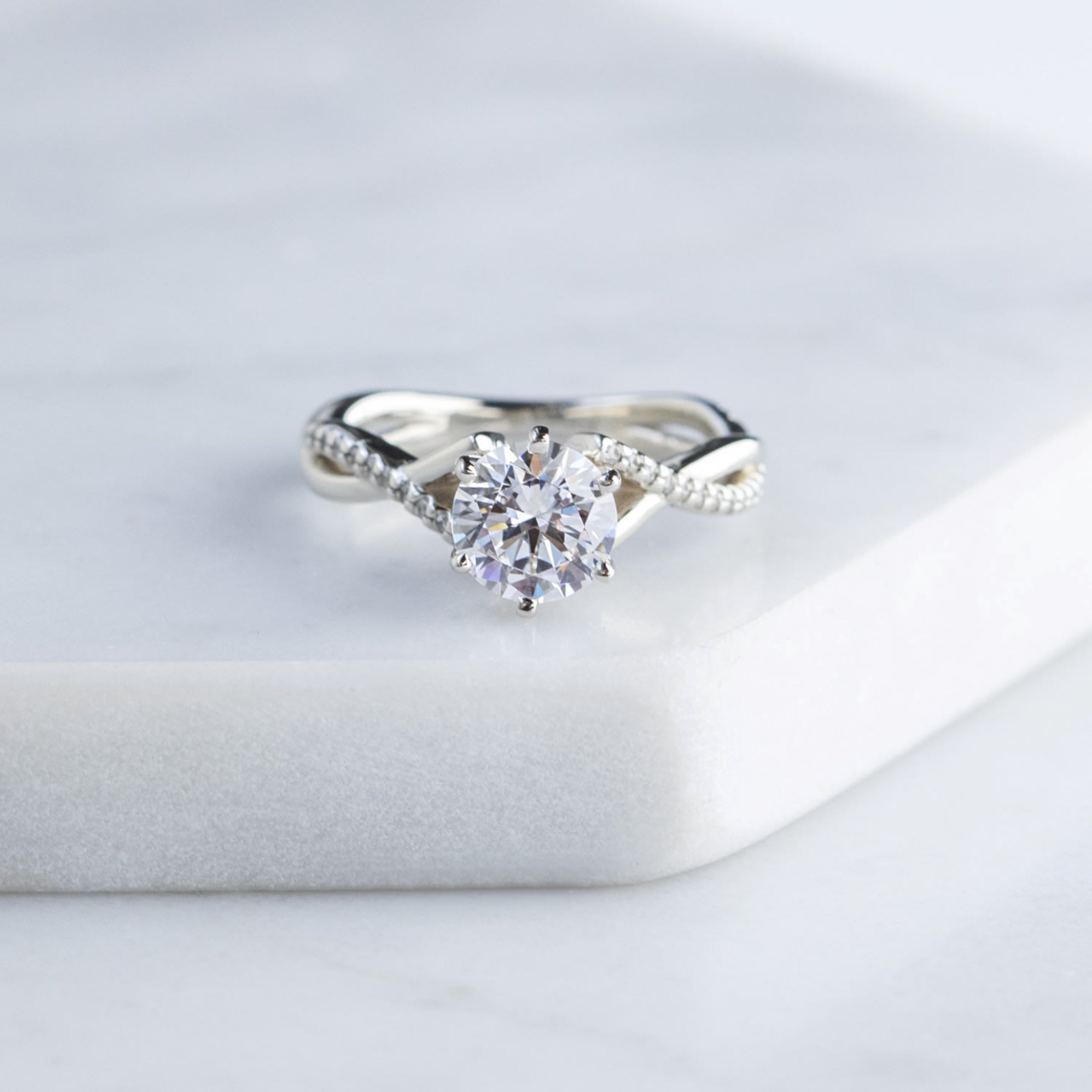 Brilliant Round Cut Twisted Engagement Ring