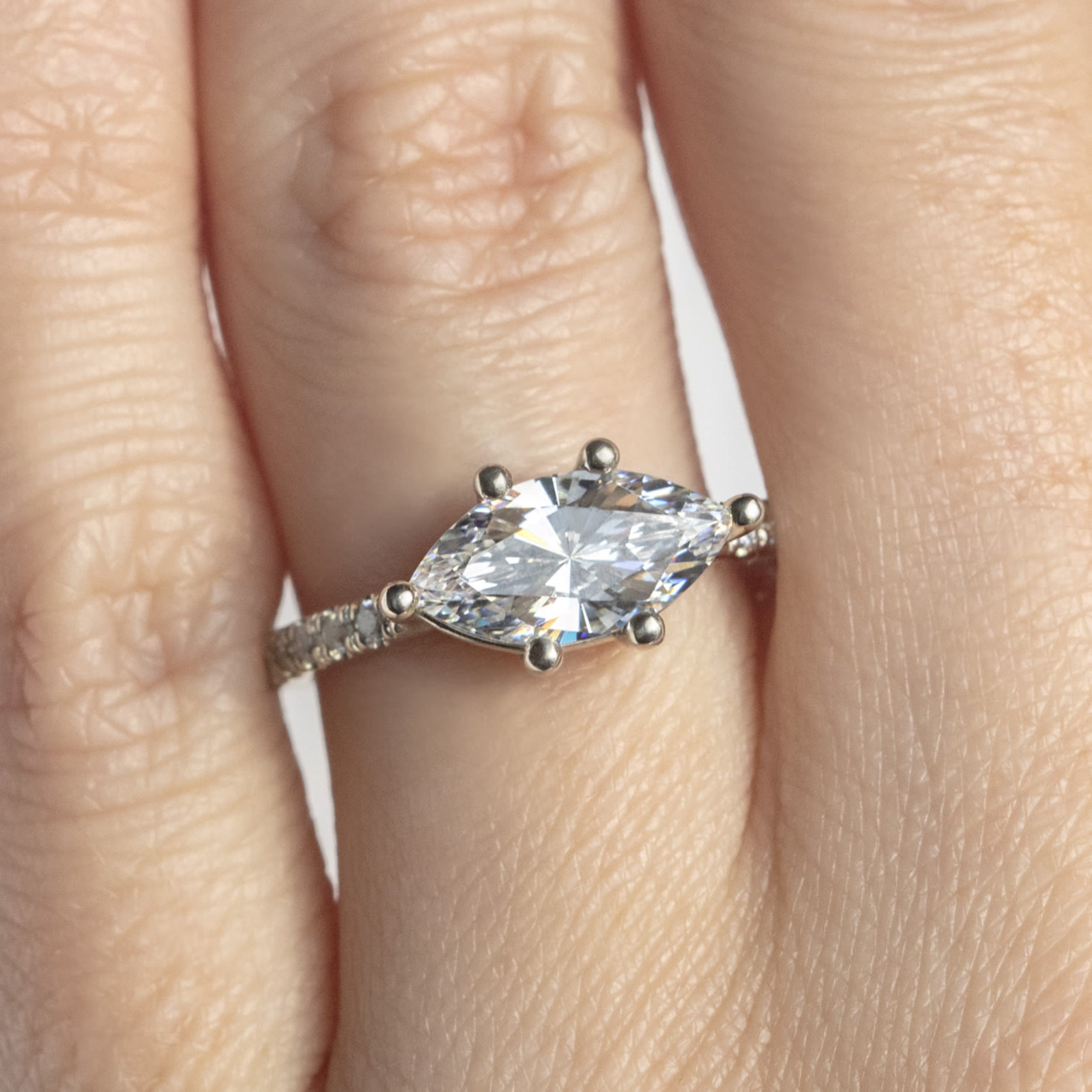 East to West Marquise Cut Moissanite Engagement Ring