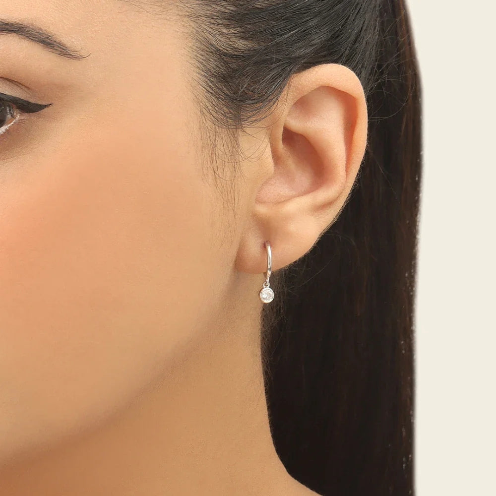 Round Cut Moissanite Bezel Drop Hoop Earrings in 14K White Gold