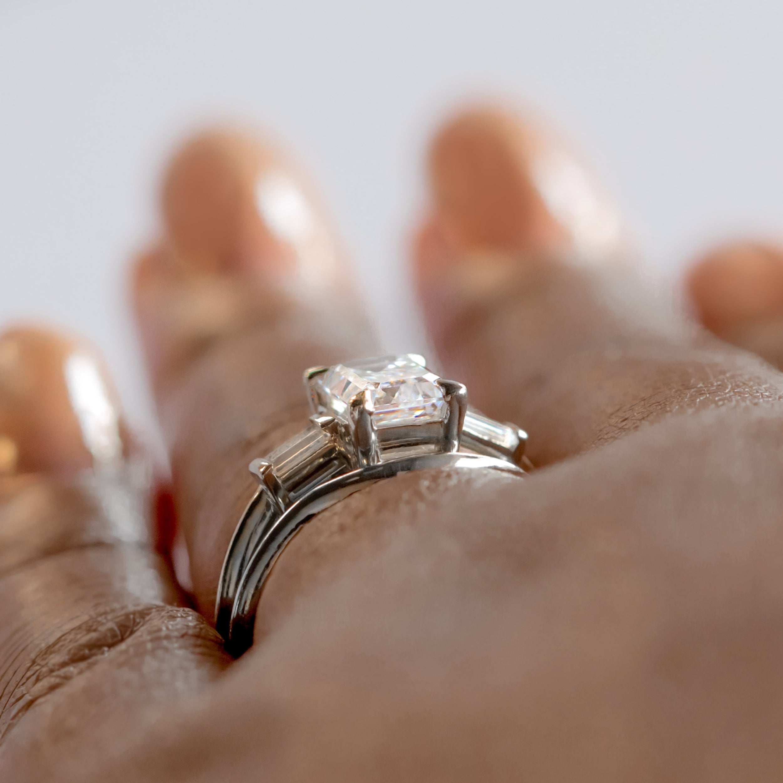 Emerald Cut Three Stone Engagement Ring
