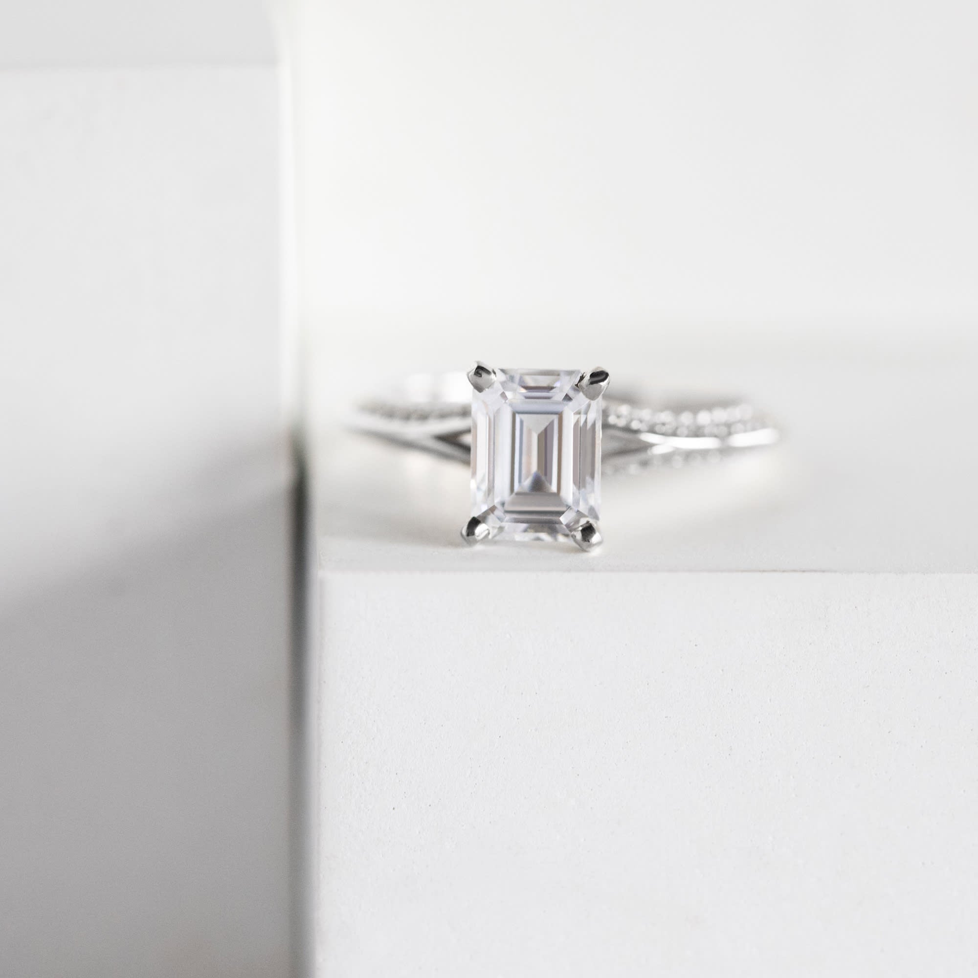 Emerald Cut Split Shank Pave Set Engagement Ring