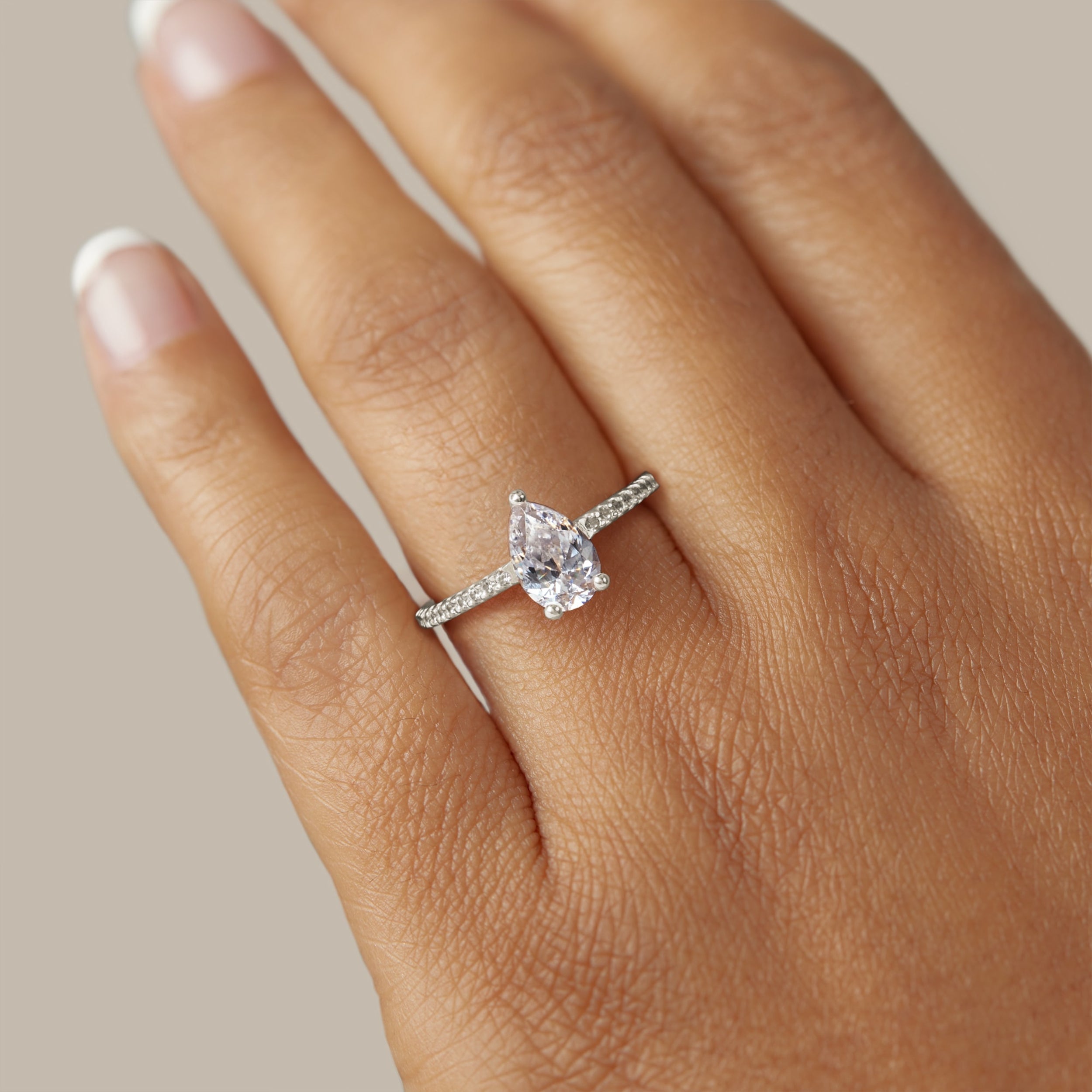 Basket Set Pear Cut Pave Set Moissanite Engagement Ring