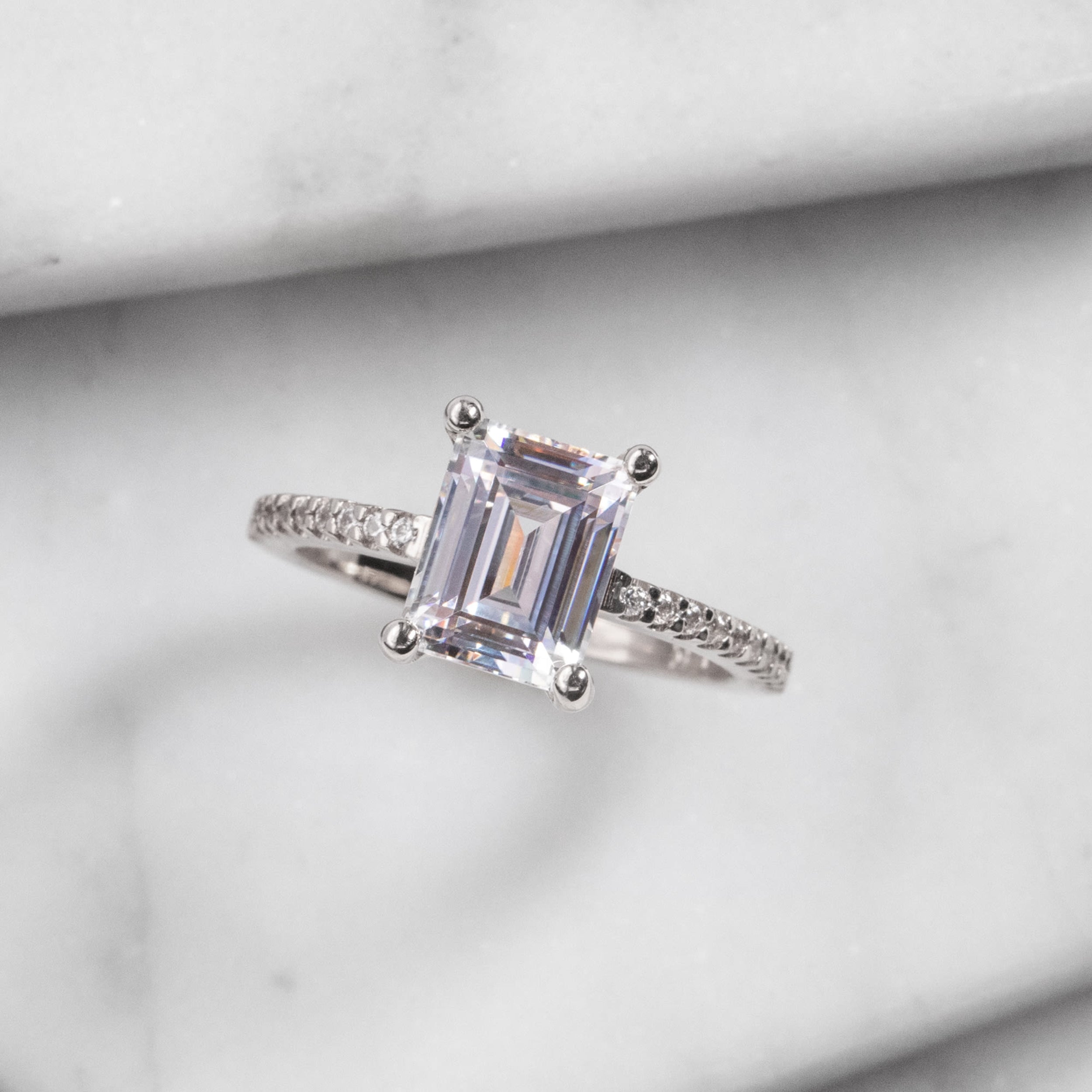 Emerald Cut Pave Set Moissanite Engagement Ring