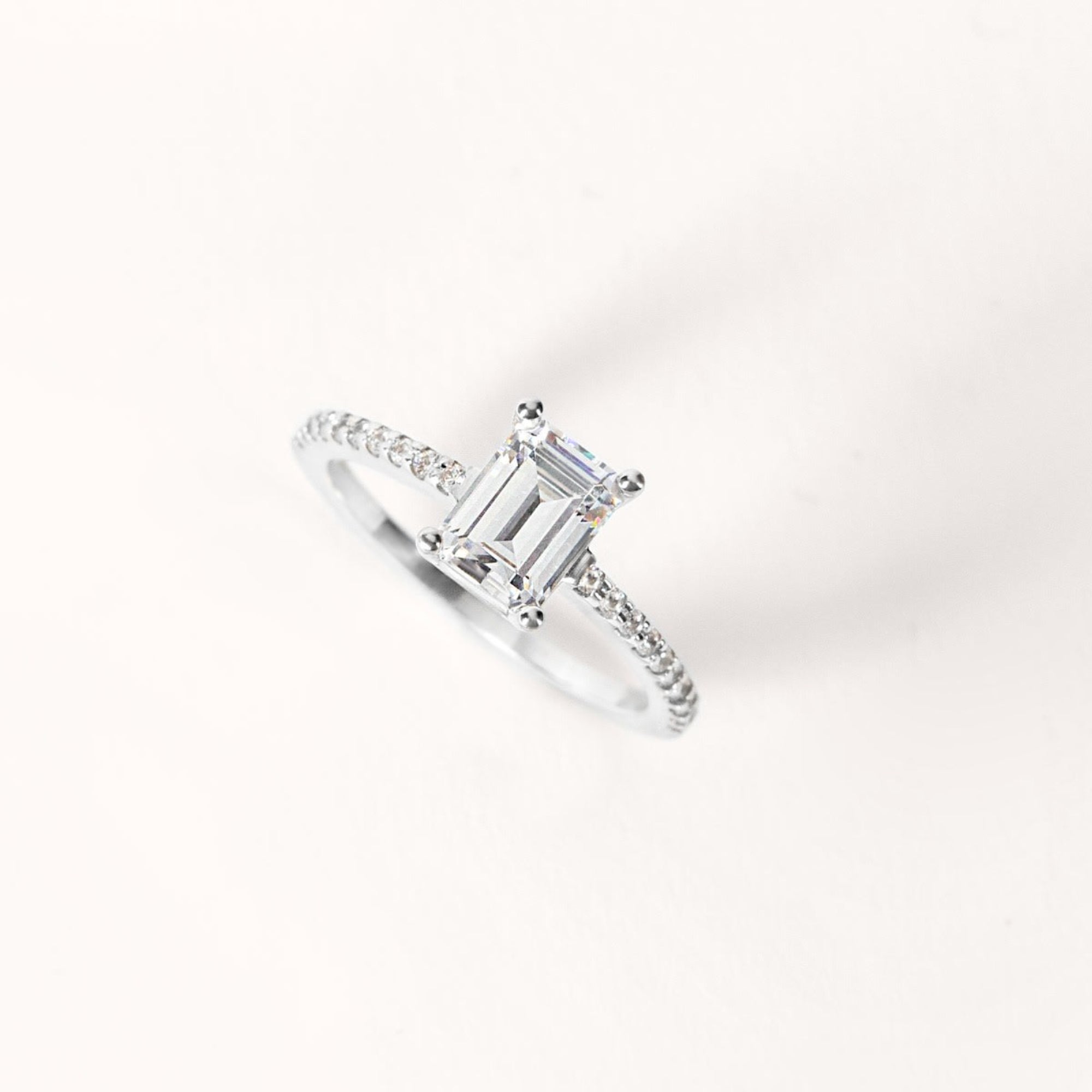 Emerald Cut Pave Set Moissanite Engagement Ring