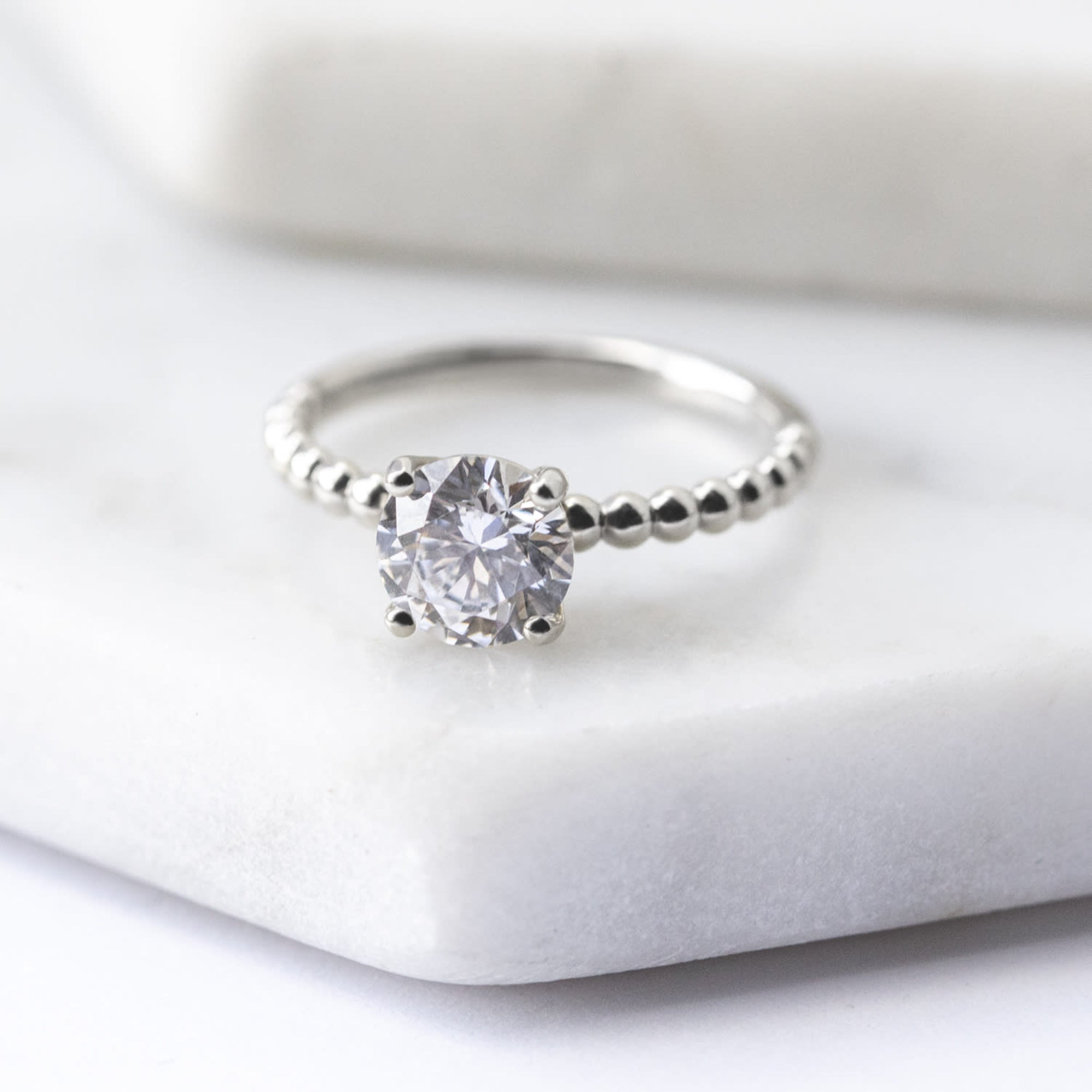 Brilliant Round Cut Beaded Solitaire Engagement Ring