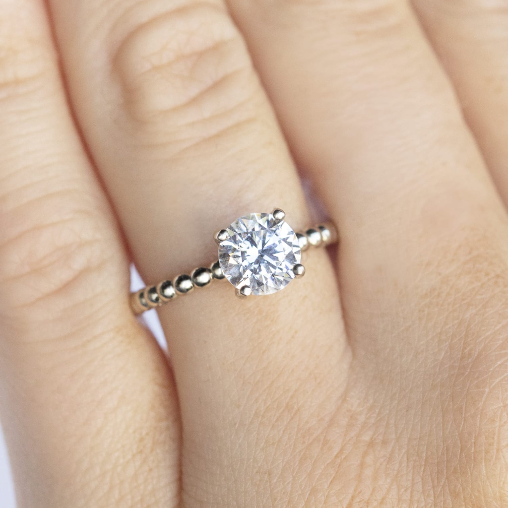 Brilliant Round Cut Beaded Solitaire Engagement Ring