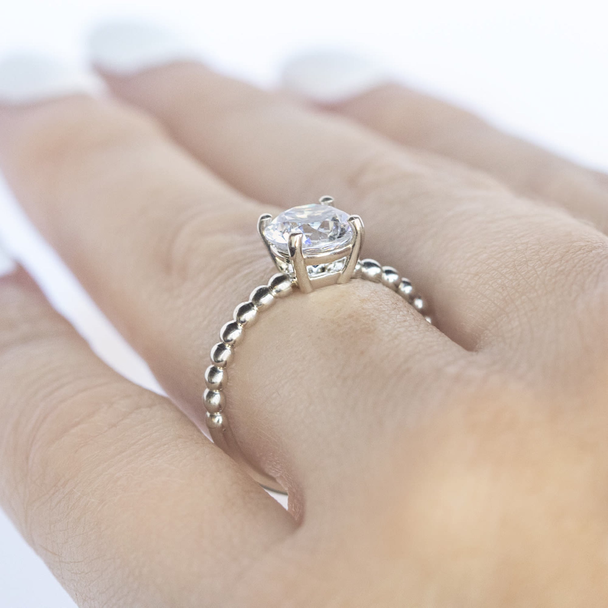 Brilliant Round Cut Beaded Solitaire Engagement Ring