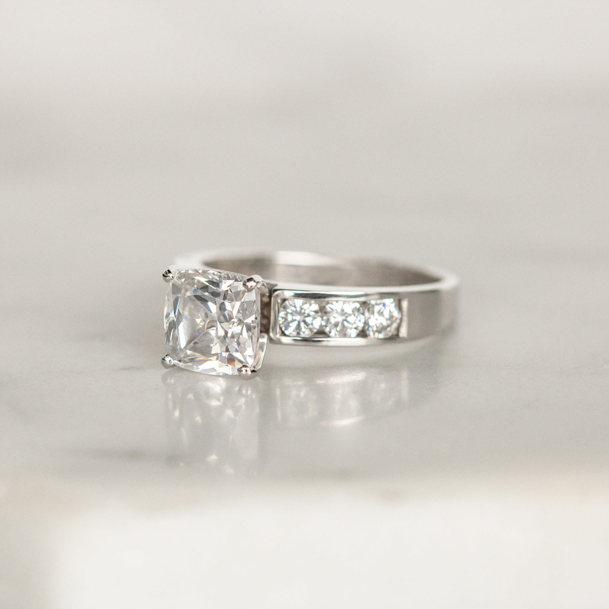 Cushion Cut Channel Set Moissanite Engagement Ring