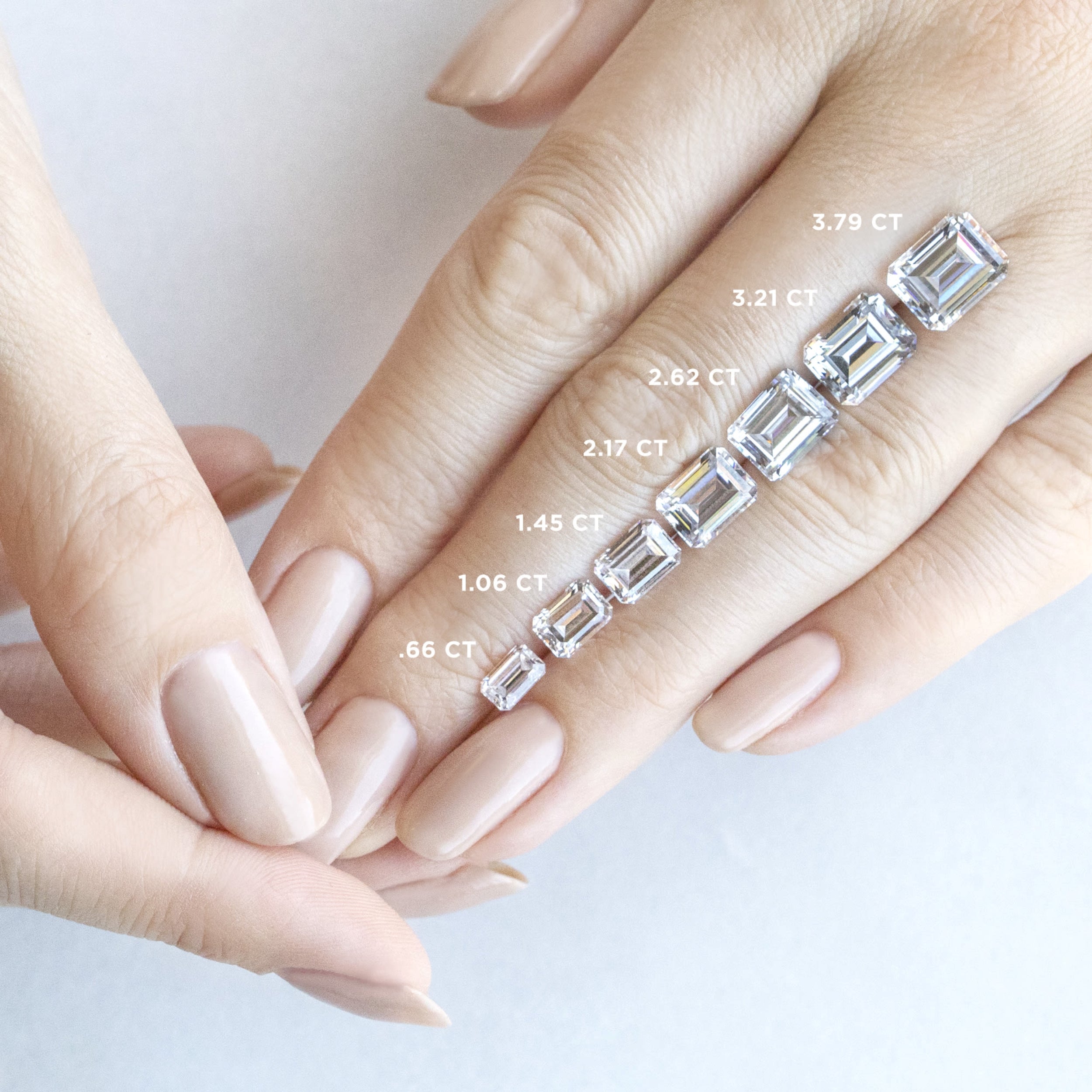 Emerald Cut Twisted Moissanite Engagement Ring