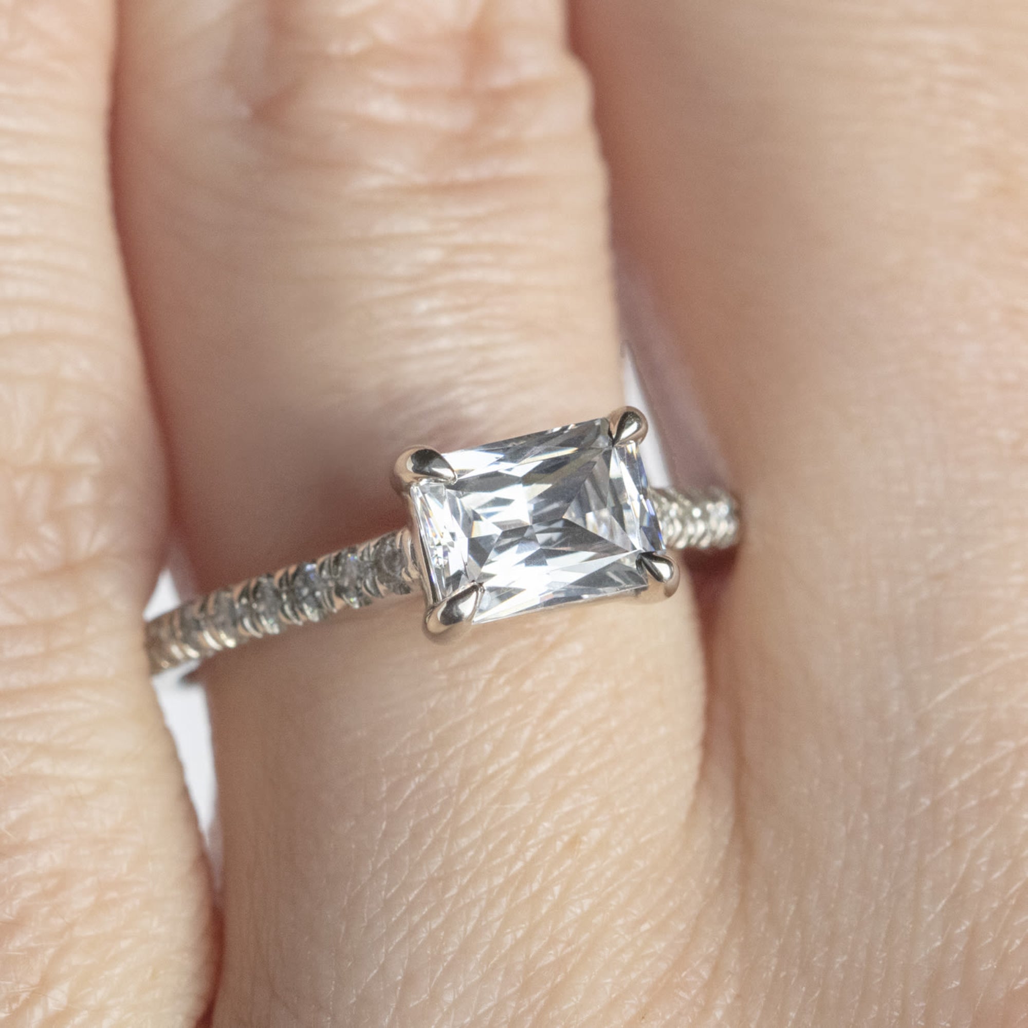 East to West Radiant Cut Pave Set Moissanite Ring