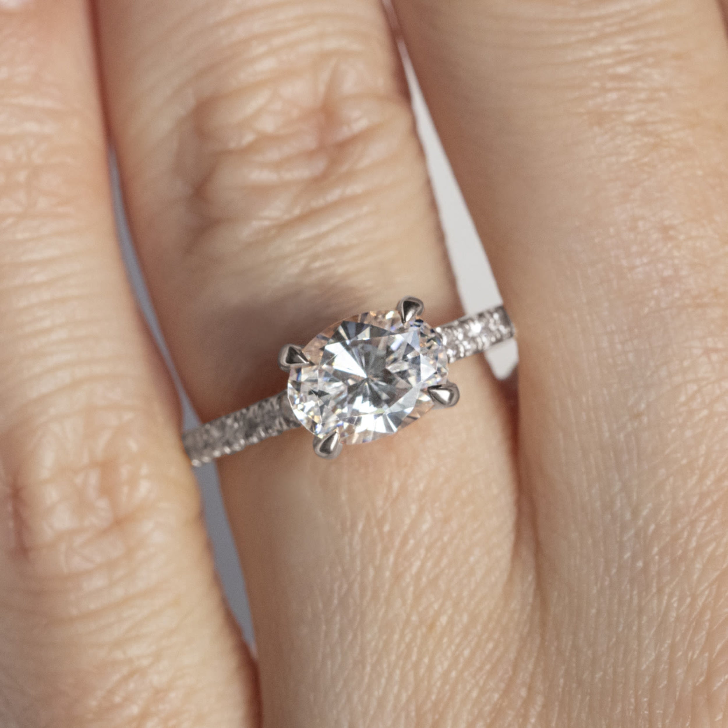 East to West Oval Cut Pave Set Engagement Ring