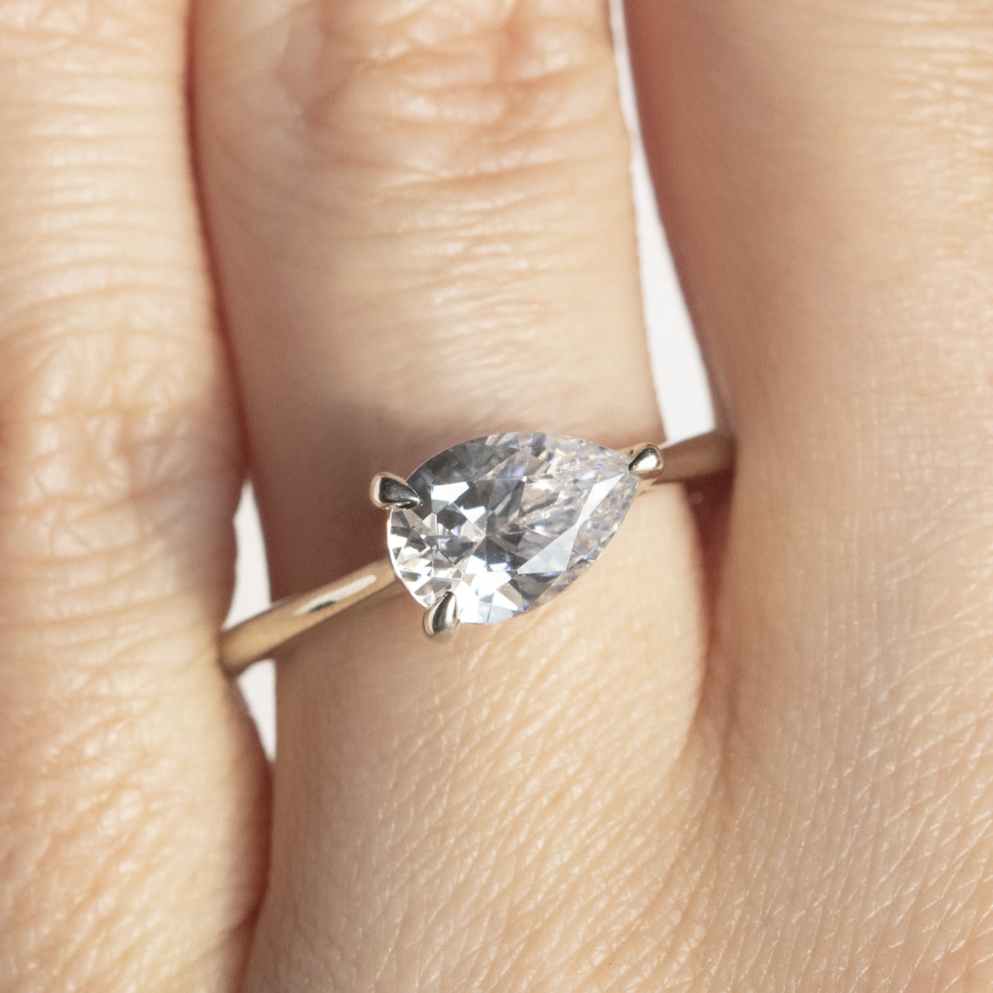 Pear Cut Solitaire Engagement Rings