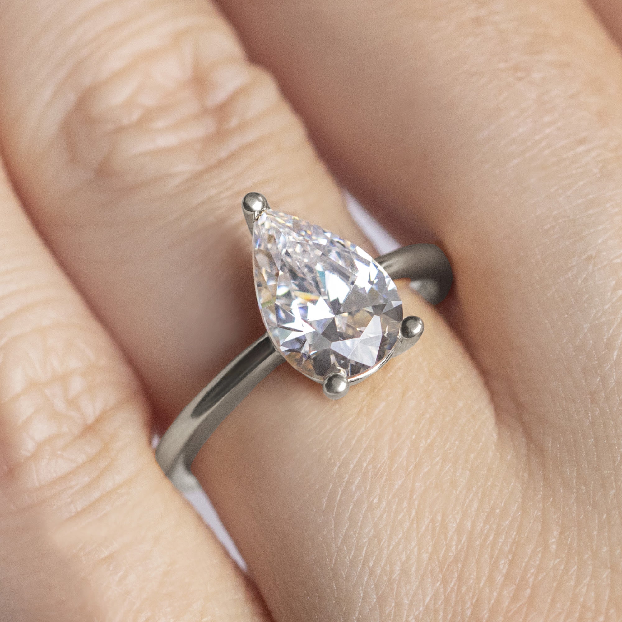 Basket Set Pear Cut Solitaire Engagement Ring