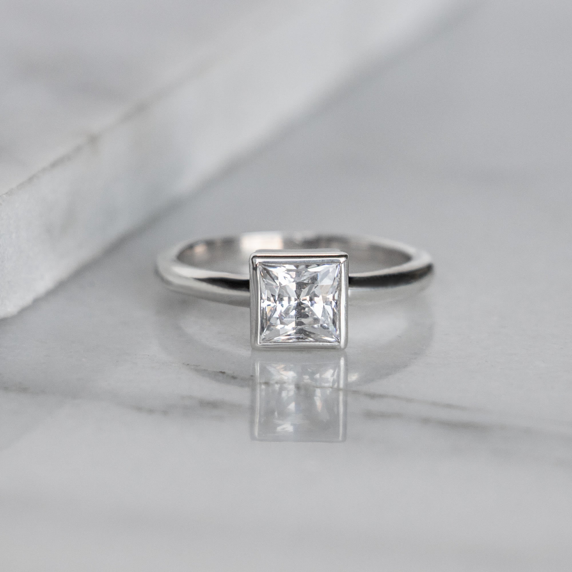 Princess Cut Bezel Cut Solitaire Engagement Ring