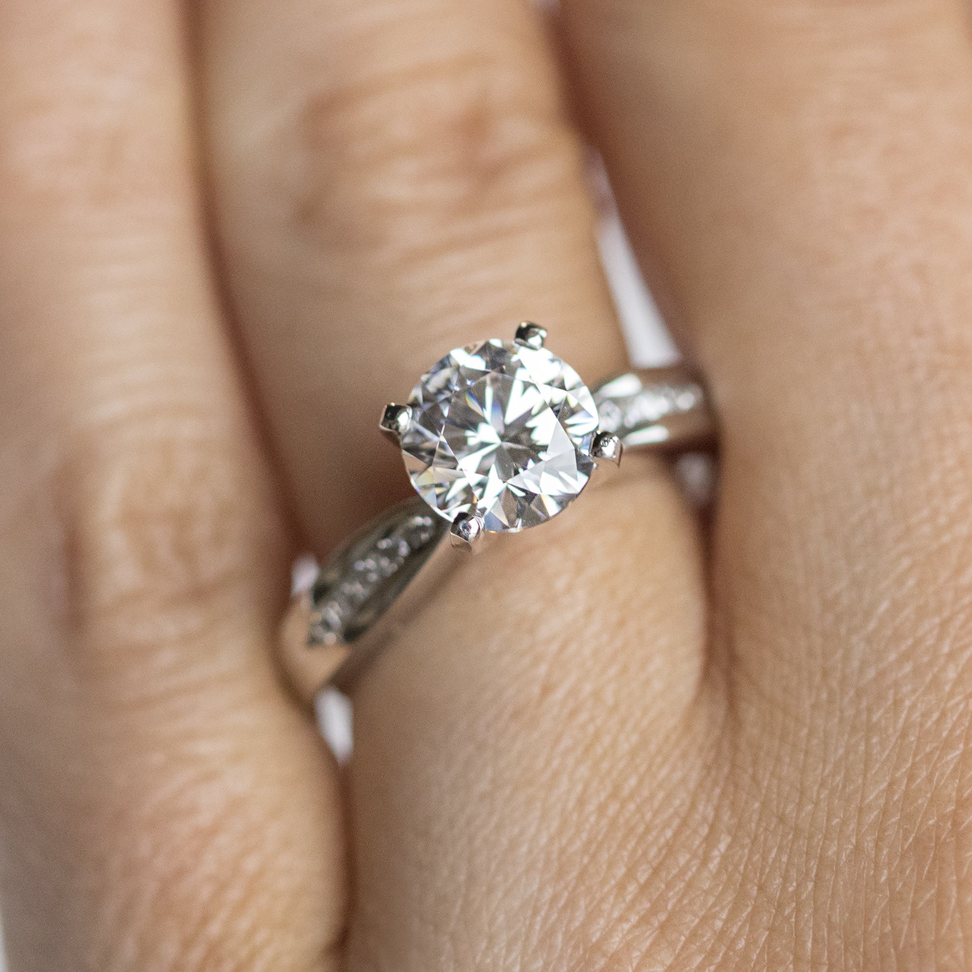 Round Cut Channel Set Moissanite Engagement Ring