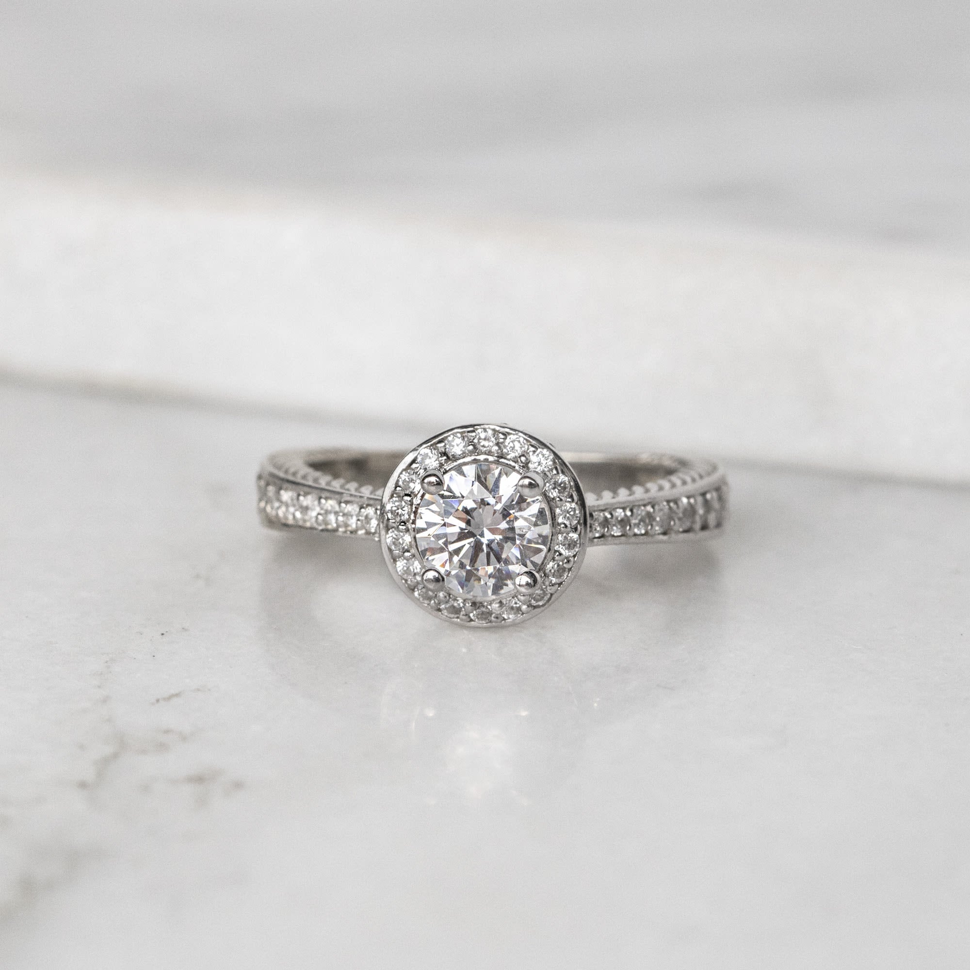 Moissanite Round Cut Hidden Accent Stone Halo Ring