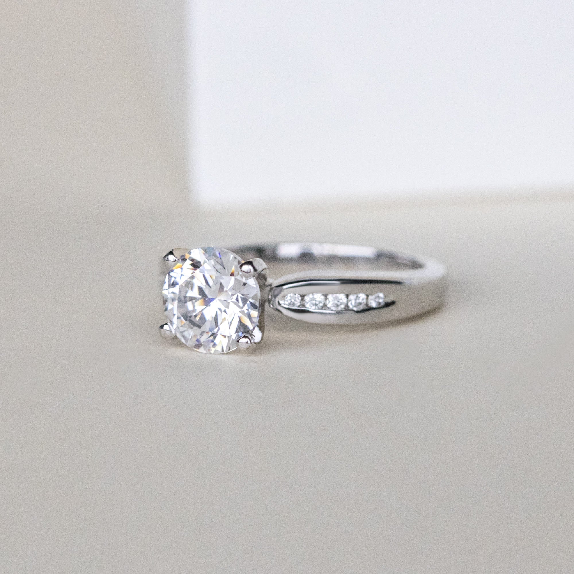 Round Cut Channel Set Moissanite Engagement Ring