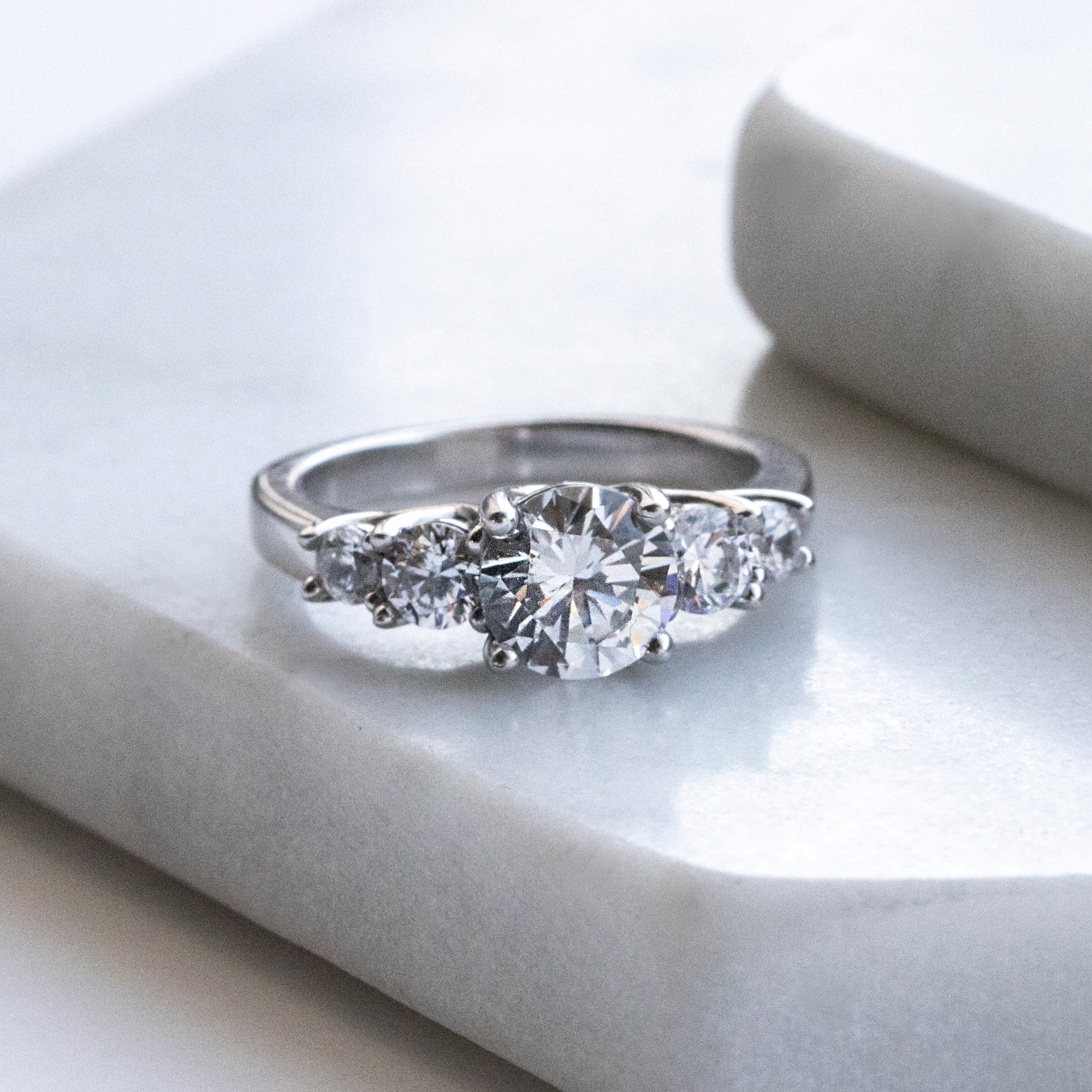 Trellis Set Round Cut Five Stone Engagement Ring