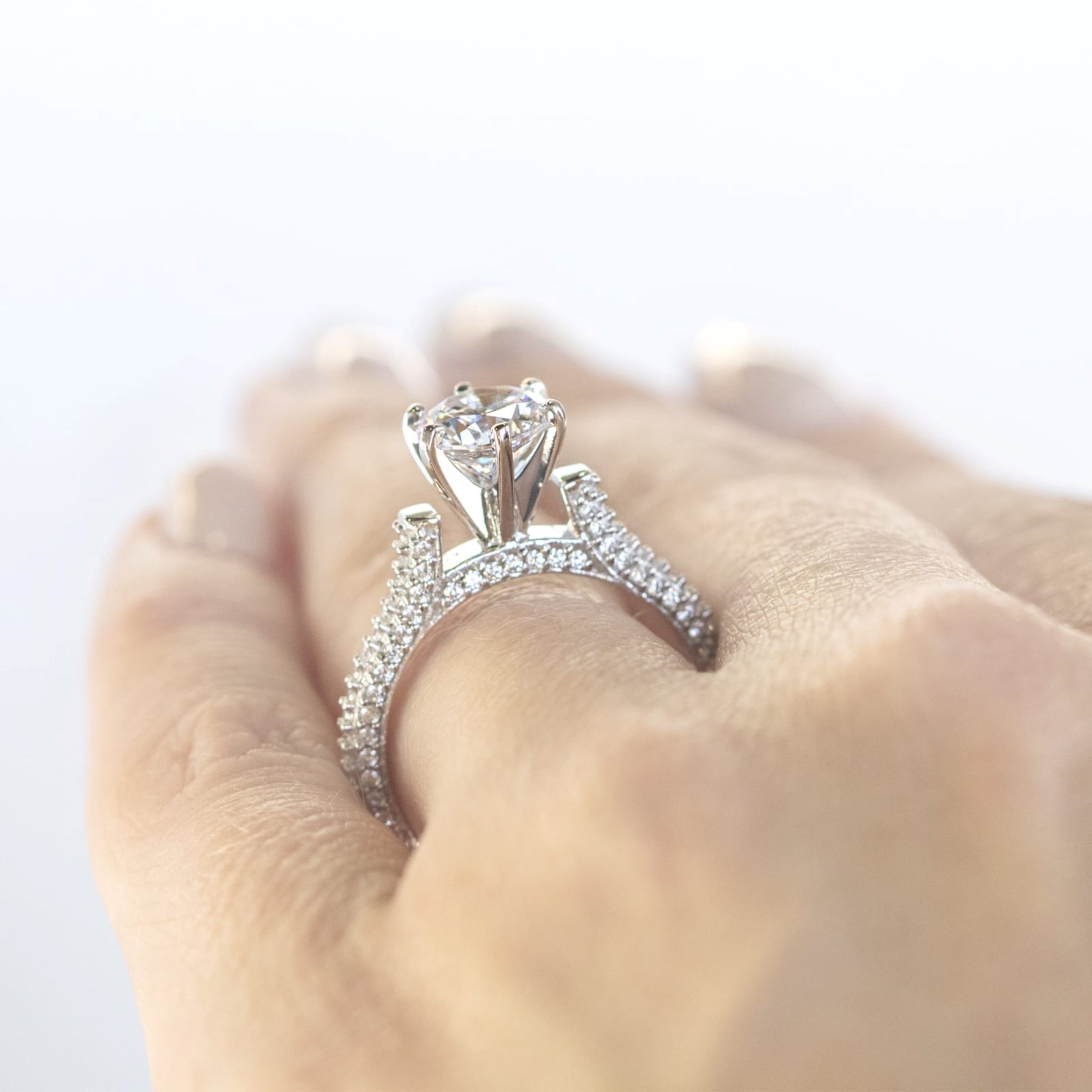 Round Cut Micro Pave Set Engagement Rings