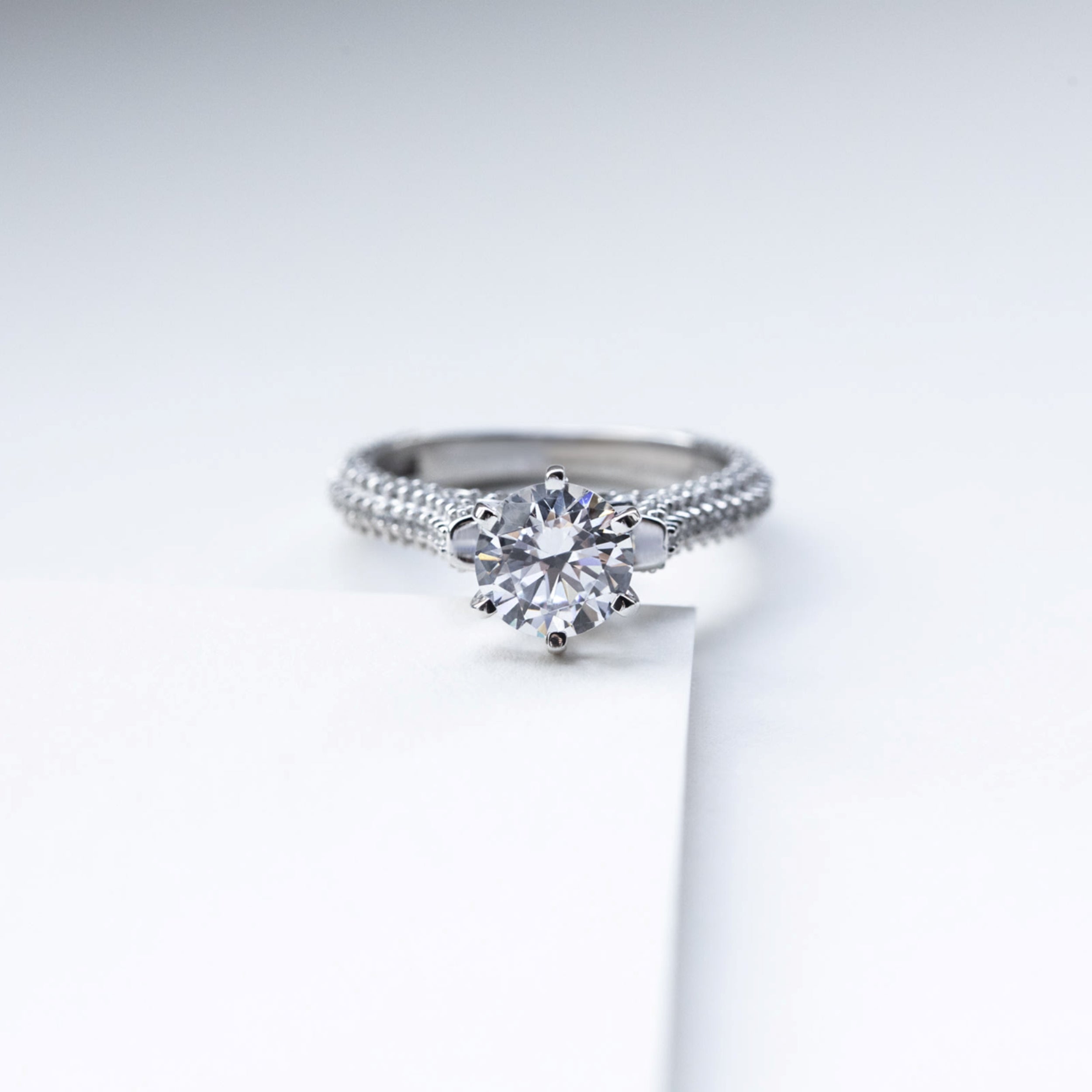 Round Cut Micro Pave Set Engagement Rings