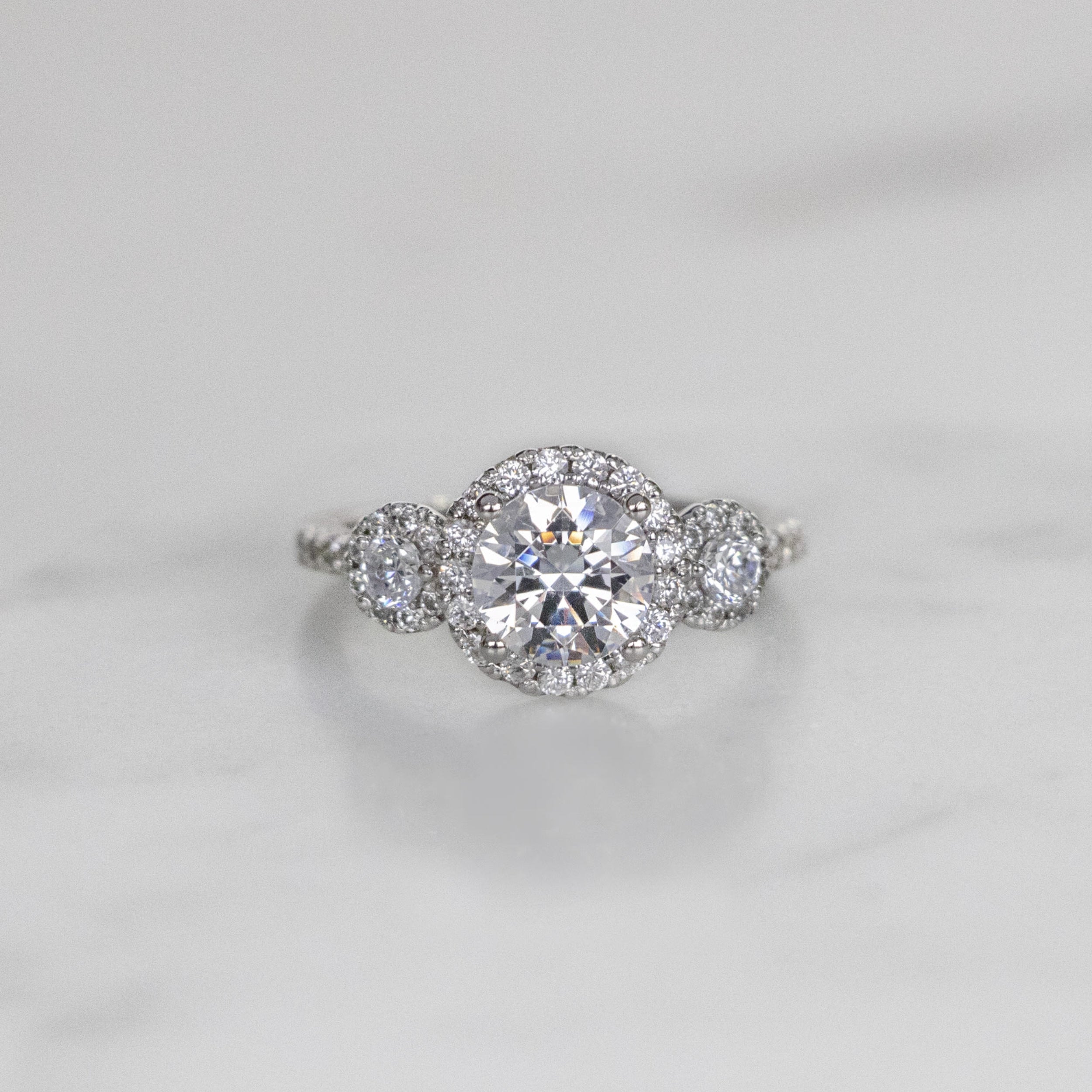 Brilliant Round Cut Three Stone Halo Engagement Ring