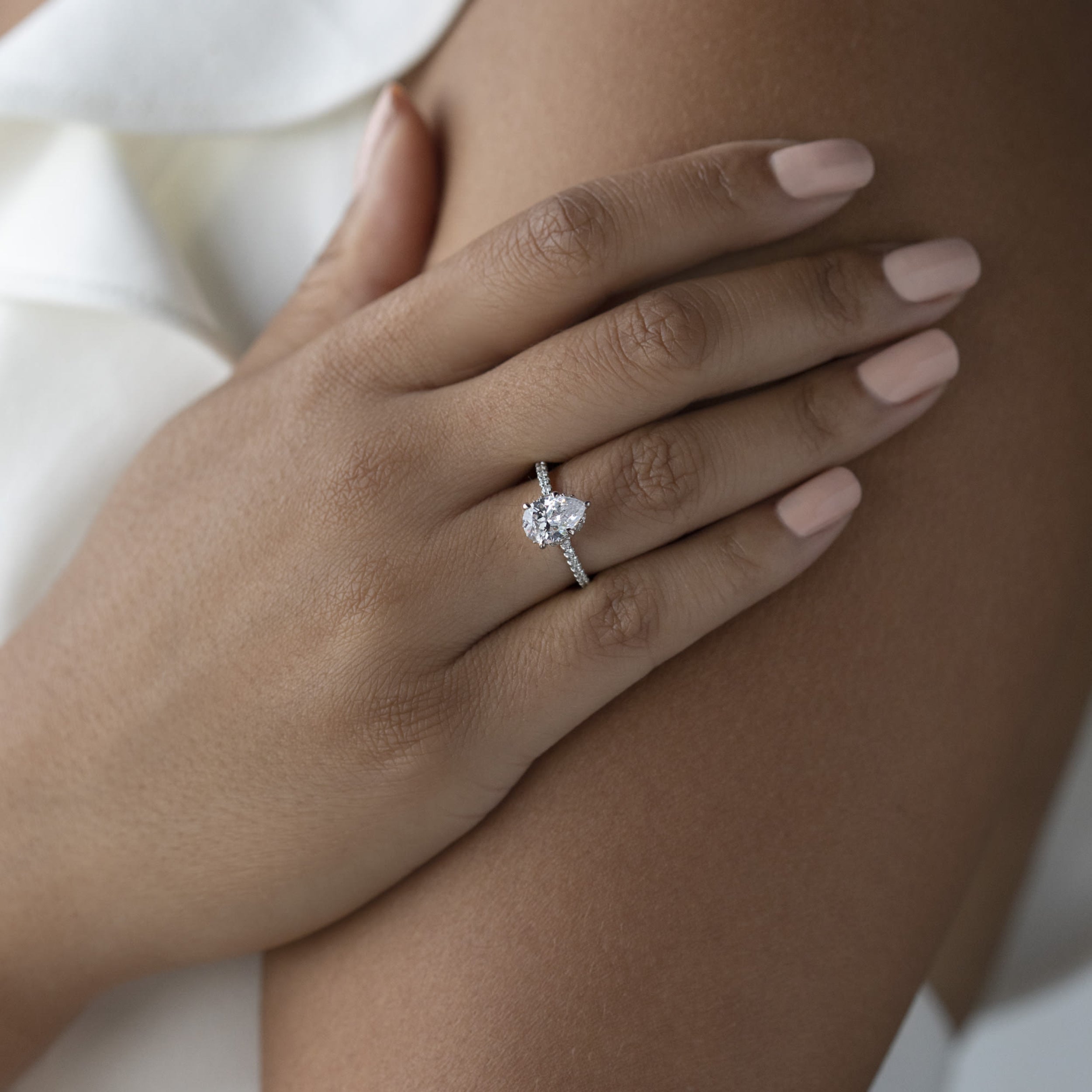 Claw Prong Pear Cut Moissanite Halo Engagement Rings
