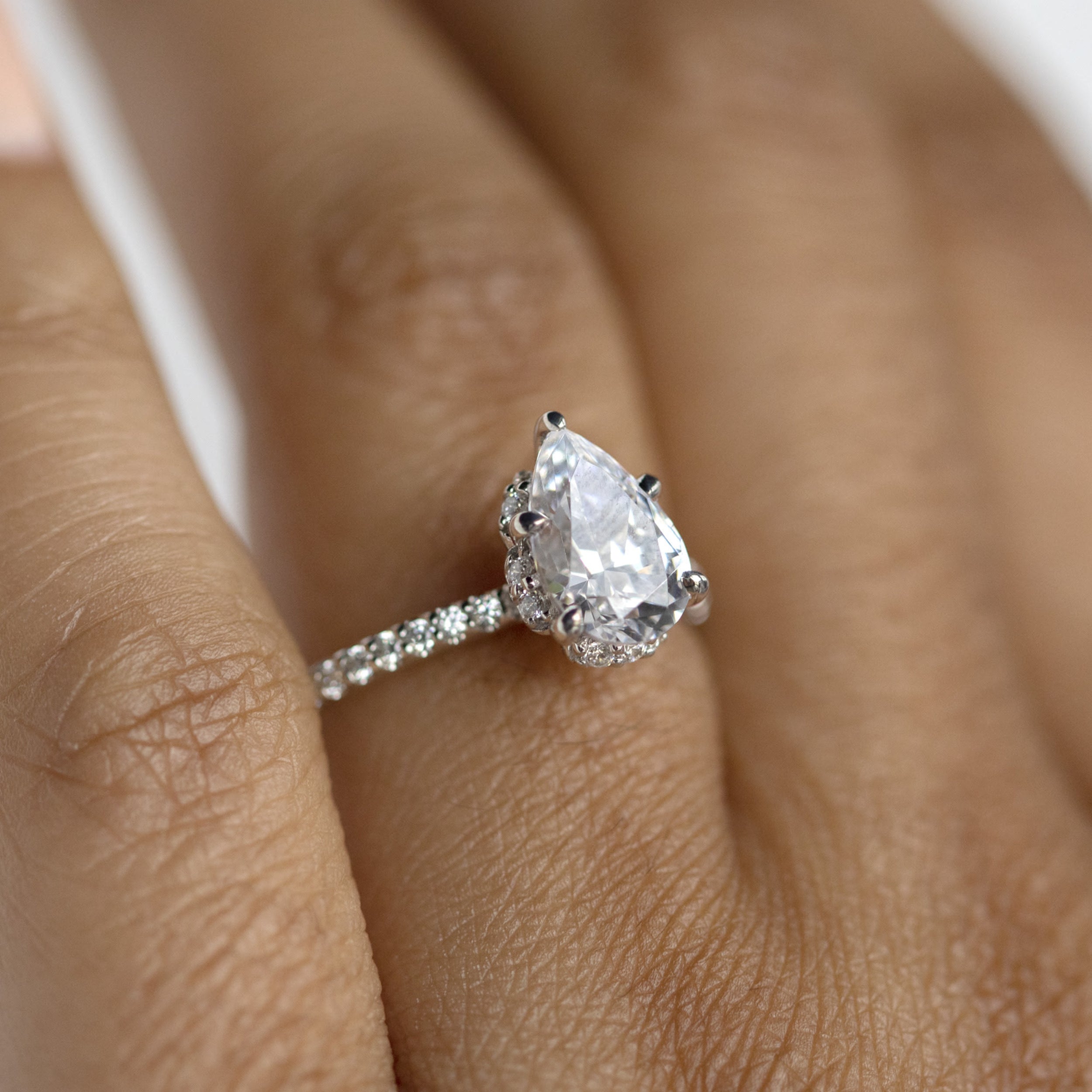 Claw Prong Pear Cut Moissanite Halo Engagement Rings